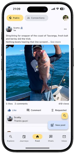 Screenshot of the Fishily app on the feed page showing a post of a person holding a fish